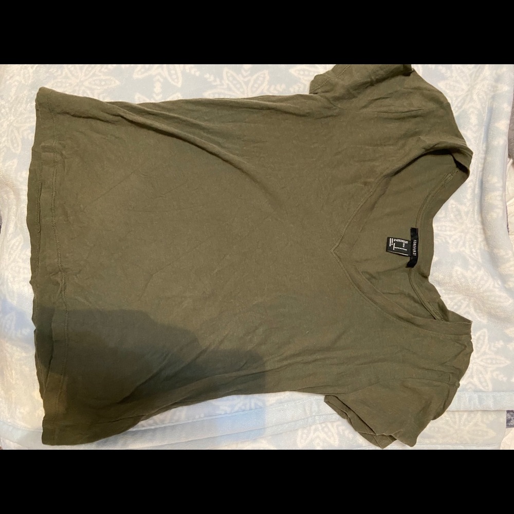 Green v-neck shirt